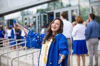 UK grad pops confetti in graduation regalia
