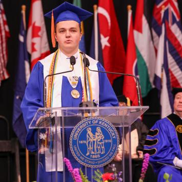 Brysen Honeycutt speaking at graduation