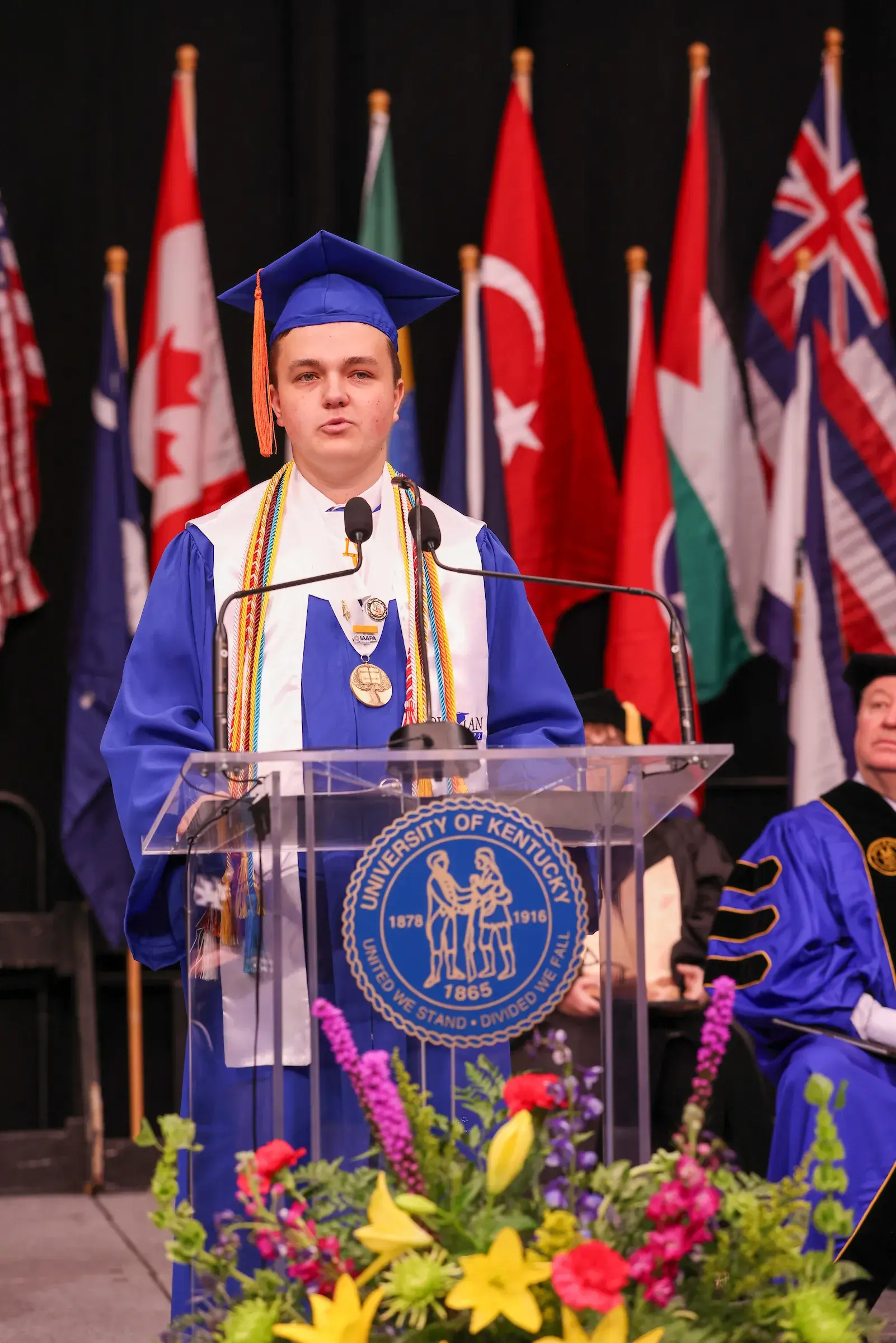 Brysen Honeycutt speaking at graduation